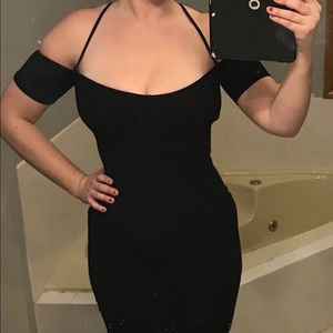 Naked wardrobe dress size medium.